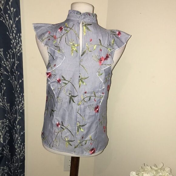 BCBGeneration Sleeveless Ruffle Embroidered Top - Picture 3 of 7